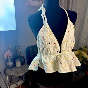 White Zara Halter with peplum and color stitching detail.